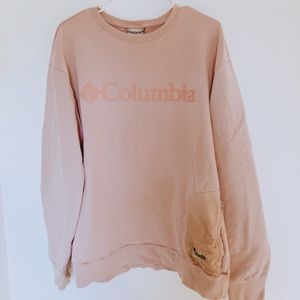 Dusty Rose Columbia sweater with a zippered side pocket.